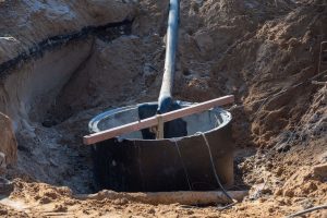 Digging around a septic tank due to tree root issues