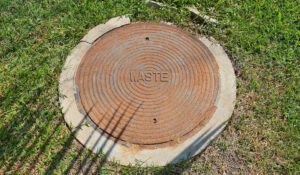 Abandoned Septic Tank System in the middle of a lawn 