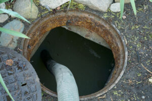 pumping septic tanks from the backyard tank in the countryside